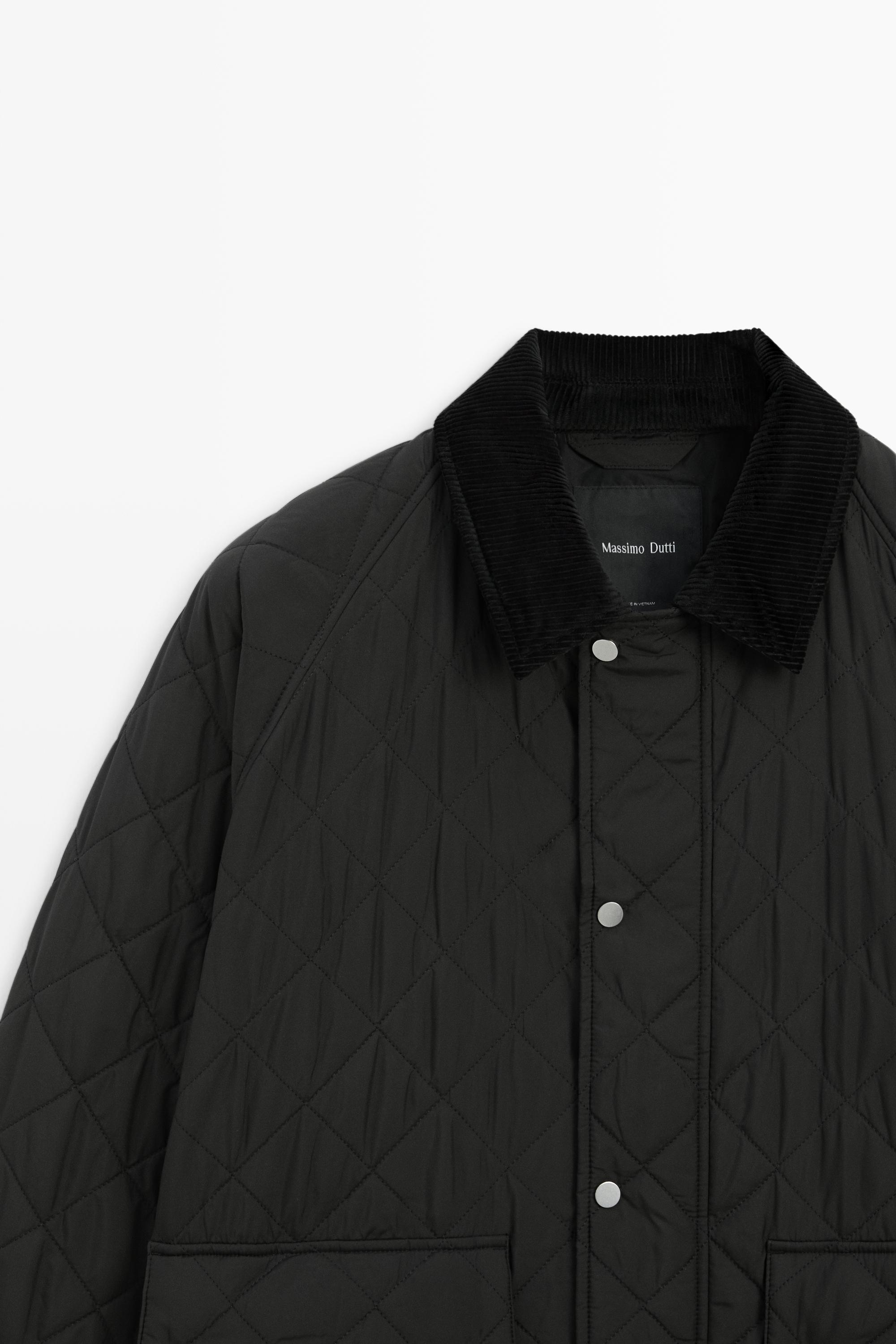 Quilted jacket with corduroy collar